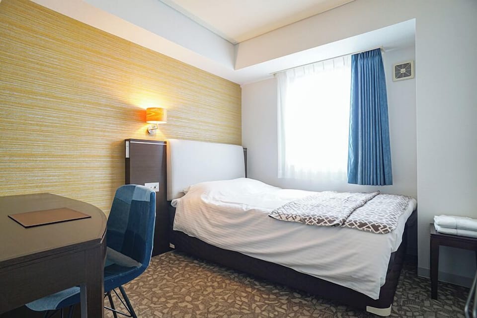 Desk, blackout drapes, iron/ironing board, free WiFi
