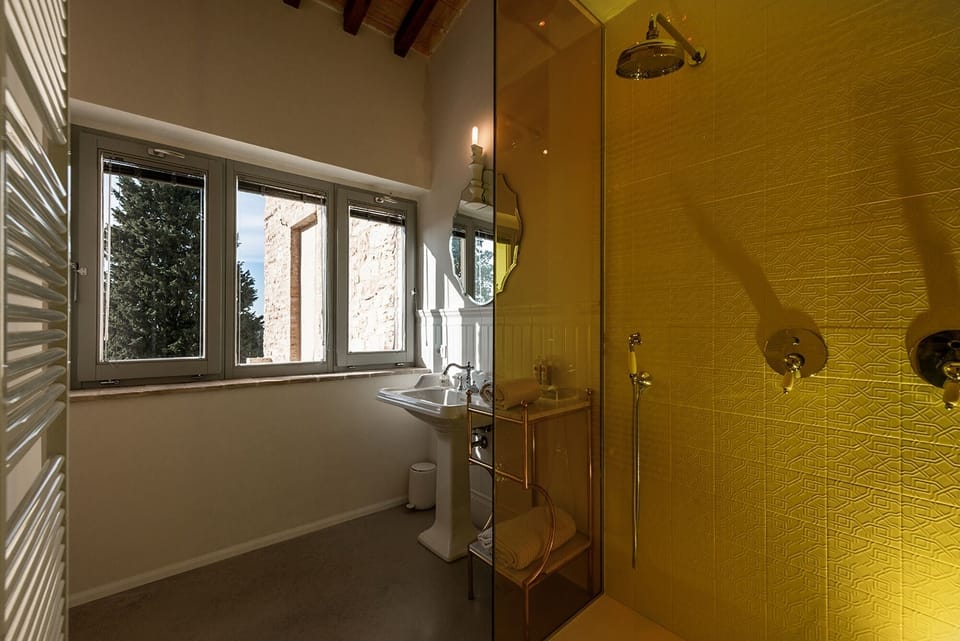 Suite, Balcony | Bathroom | Designer toiletries, hair dryer, bathrobes, slippers