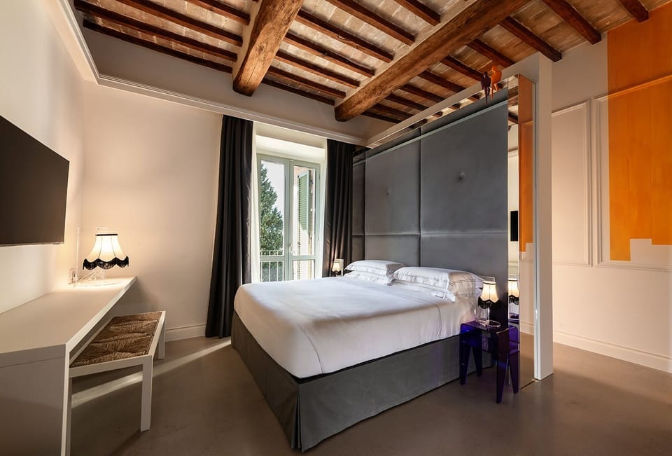 Suite, Balcony | 1 bedroom, minibar, in-room safe, desk