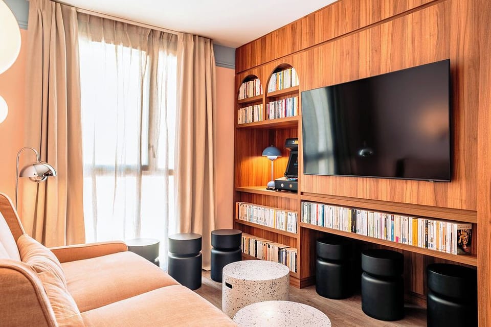 Apartment (9 people) | Living area | 80-cm flat-screen TV with cable channels, pay movies