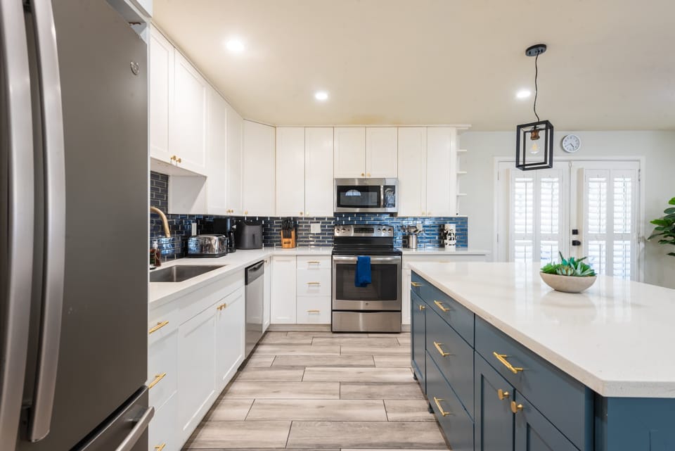 Clean, modern kitchen perfect for brewing morning coffee or quick bites