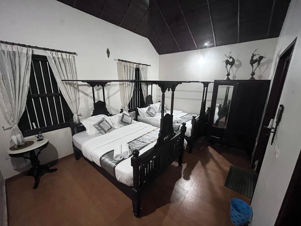 Deluxe Quadruple Room, Mountain View | Blackout drapes, iron/ironing board
