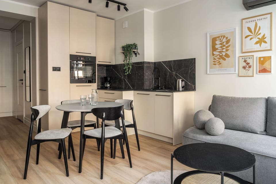 Apartment, Balcony, City View | Living area | Flat-screen TV