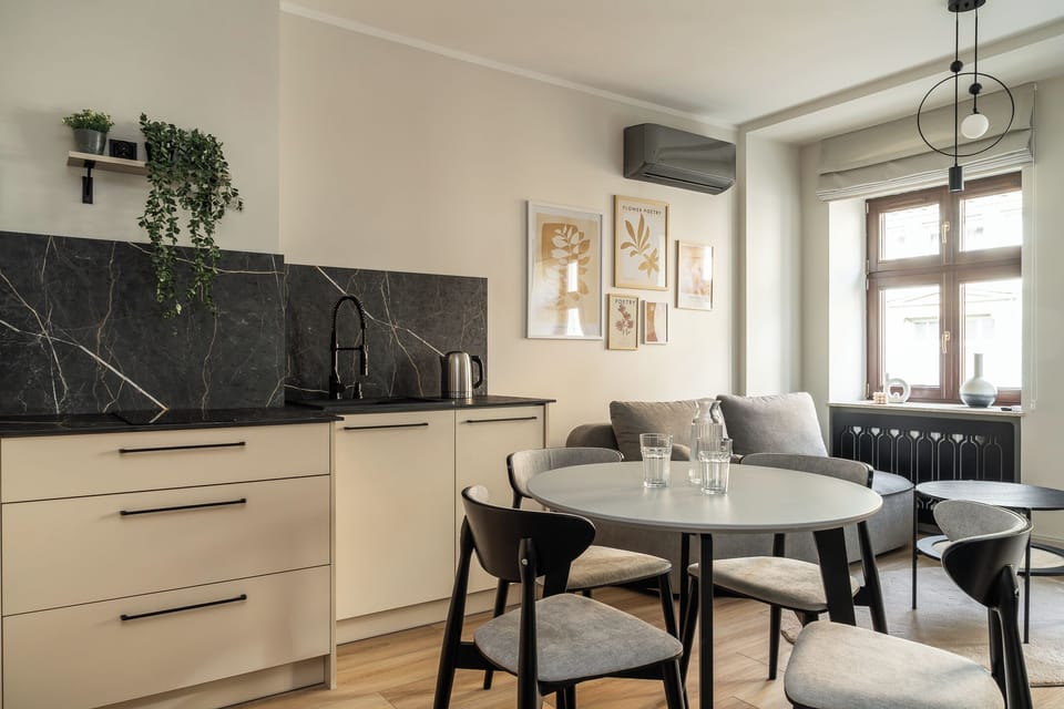 Apartment, Balcony, City View | Living area | Flat-screen TV