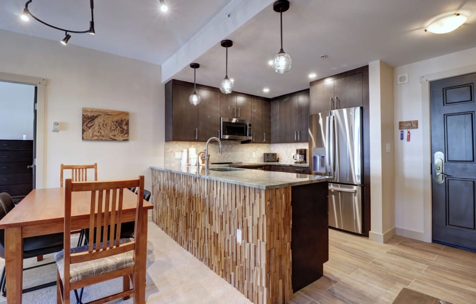 Modern kitchen and dining area.