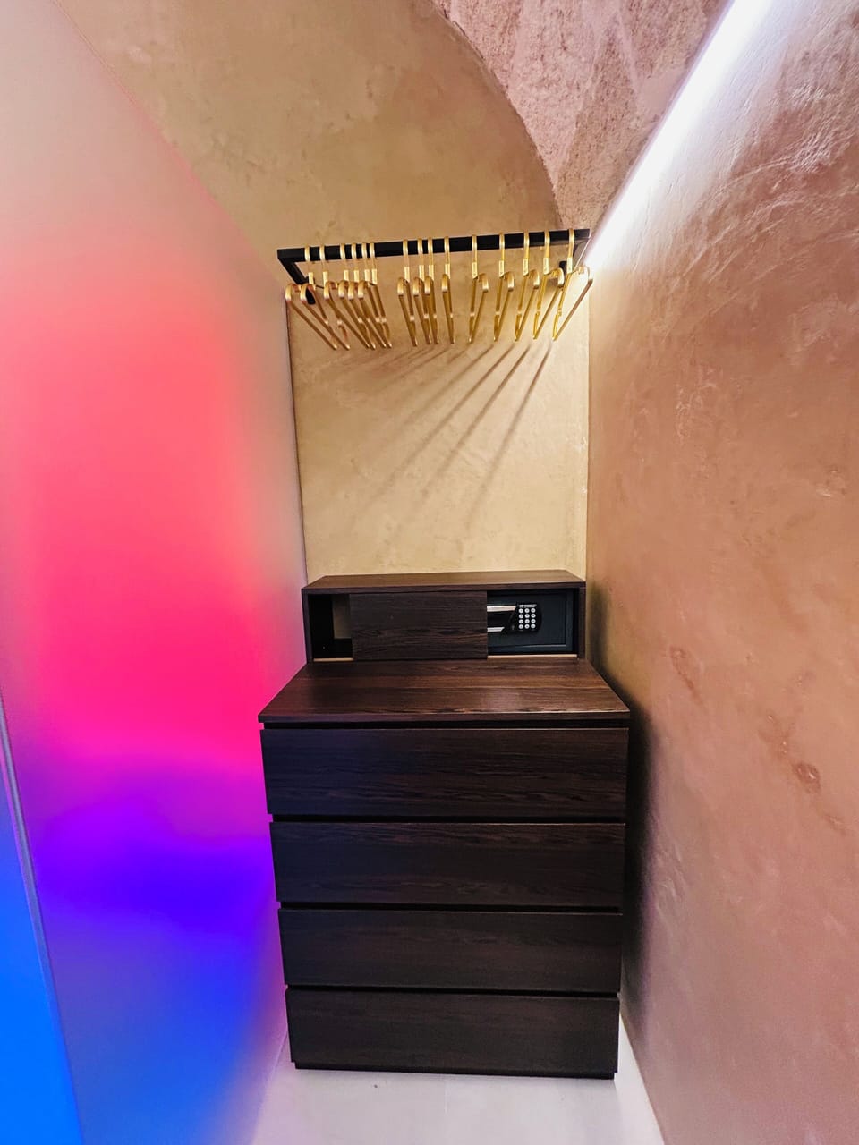 Chest of drawers and clothes hanger