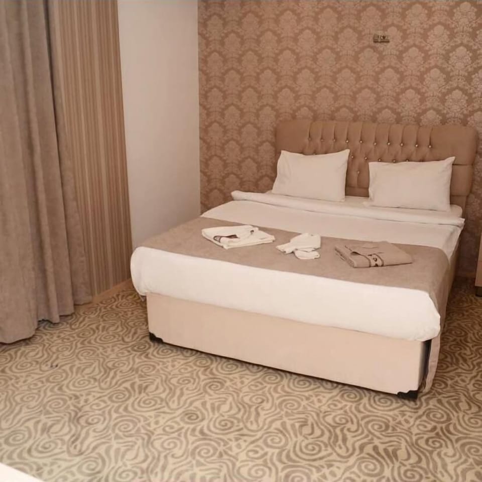 Comfort Room, City View | Desk, laptop workspace, blackout drapes, soundproofing