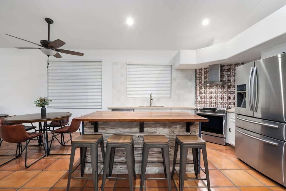 Fully-equipped kitchen with quality appliances and a complete set of cookware