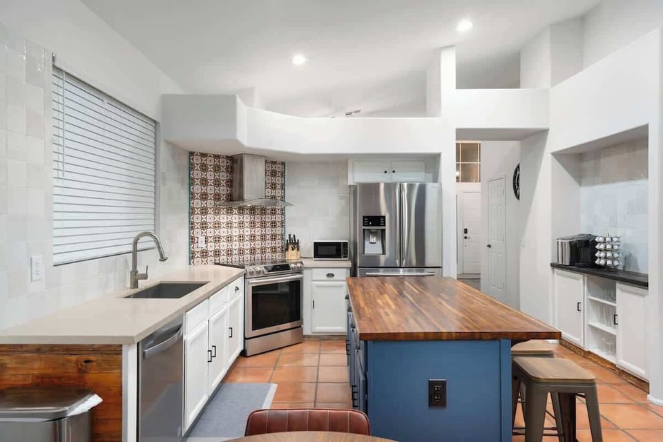 Fully-equipped kitchen with quality appliances and a complete set of cookware