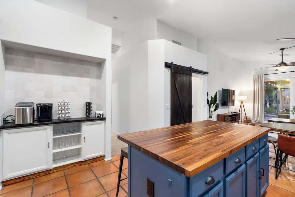 Fully-equipped kitchen with quality appliances and a complete set of cookware