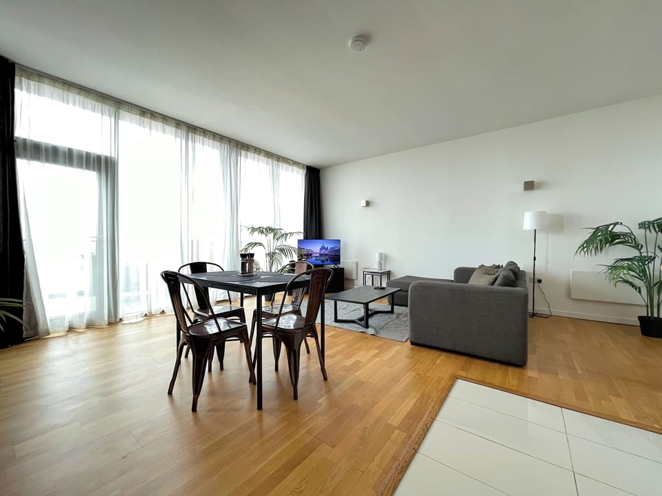 Luxury Apartment, City View | Living area | 40-inch LED TV with digital channels