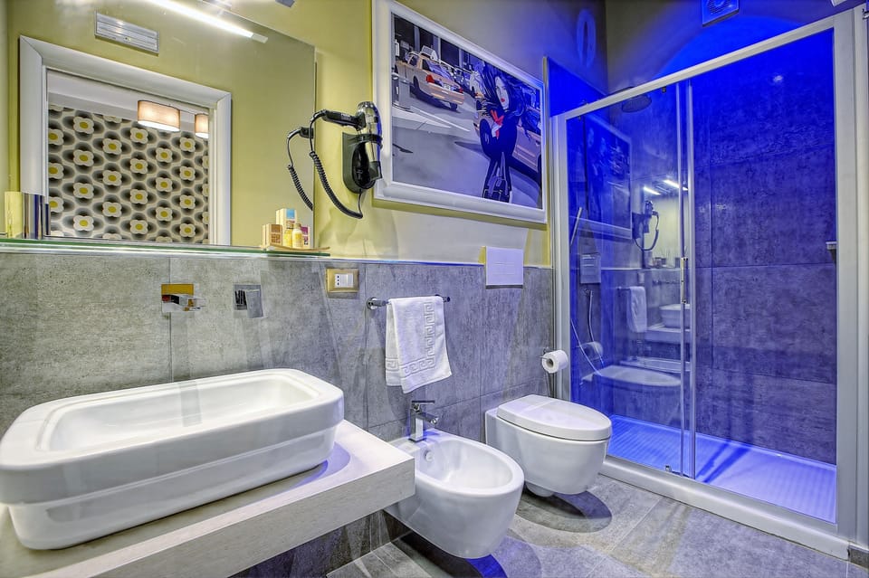 Classic Triple Room, Balcony (Tortora) | Bathroom shower