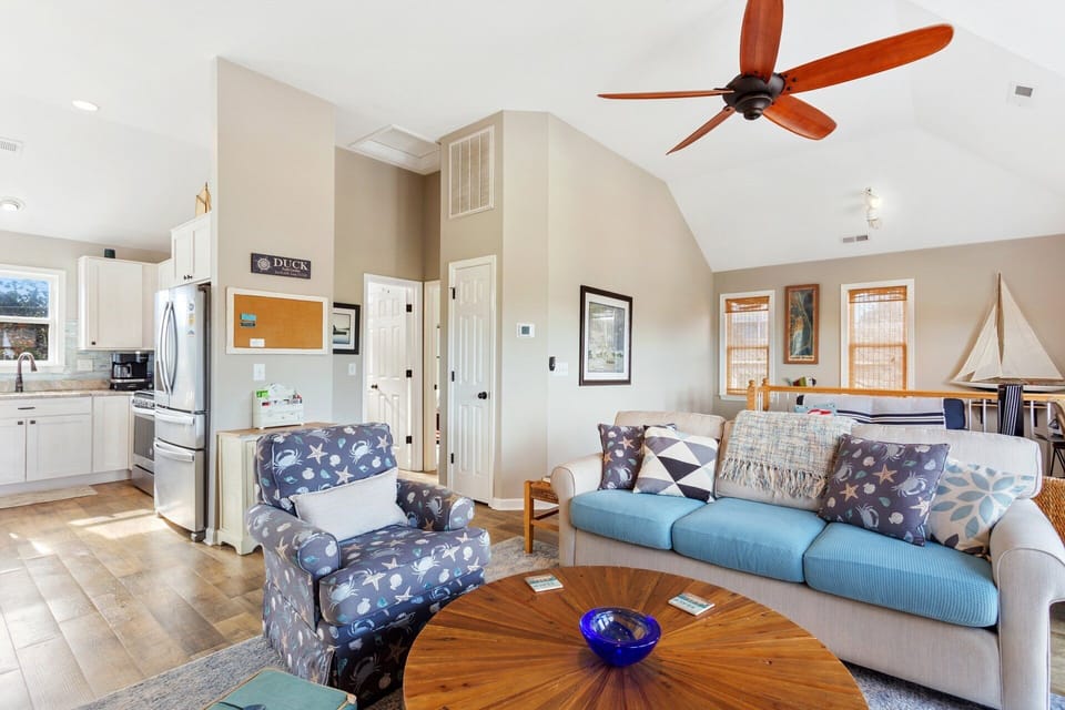 Relax in the spacious Living Area with a large, flat-screen TV.