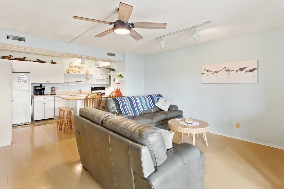Watch your favorite movies and recount the day's adventures in the spacious Living Area with a Murphy Bed.