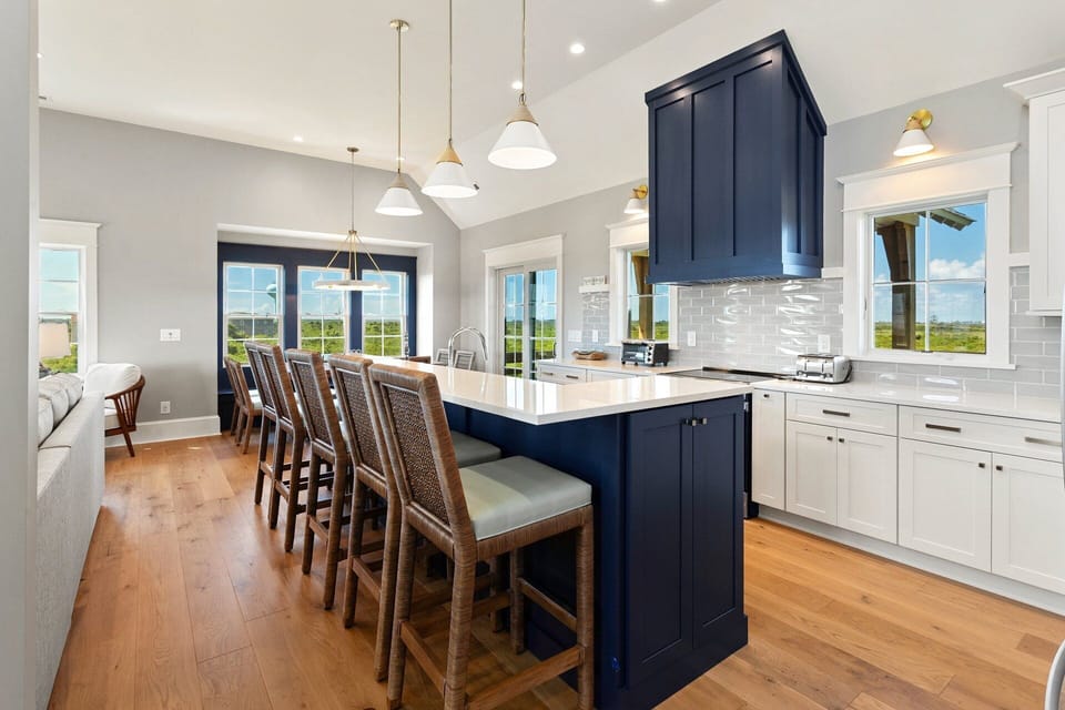 Whip up something delicious in the gorgeous modern Kitchen with expansive island!