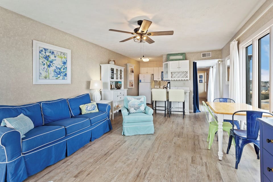 The Living Area with a Sleeper Sofa is perfect for relaxing after a day at the beach.
