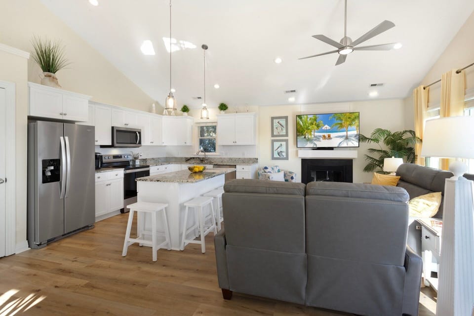 The open-concept Living Area is ideal for relaxing after a day at the beach.