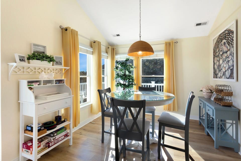 Eat together in the well-lit dining area.