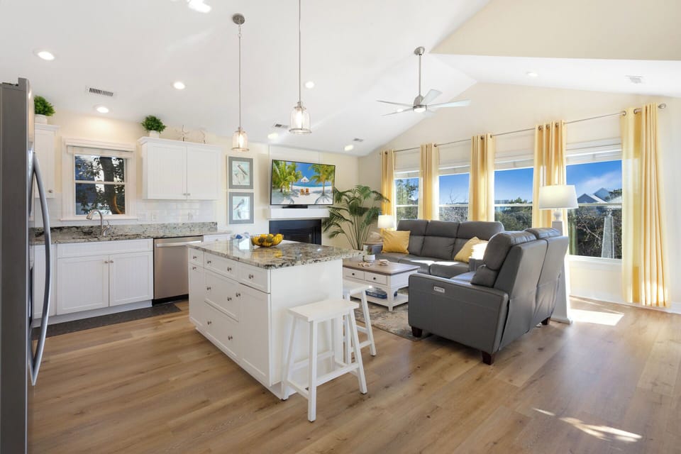 The open-concept Living Area is ideal for relaxing after a day at the beach.