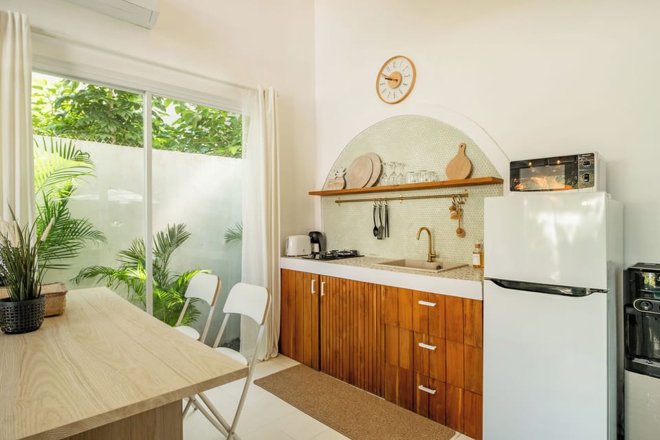 Honeymoon Villa, 1 Bedroom, Pool View | Private kitchenette | Coffee/tea maker, toaster, highchair, cleaning supplies