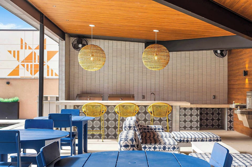 Shared hangout / grill area by the pool