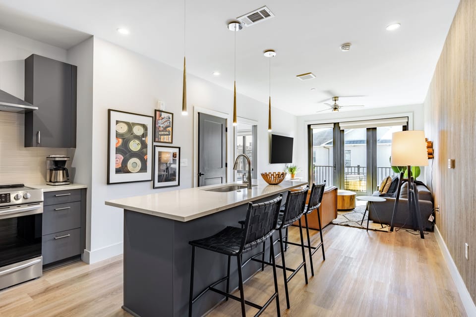 Kitchen countertop and barstool seating.