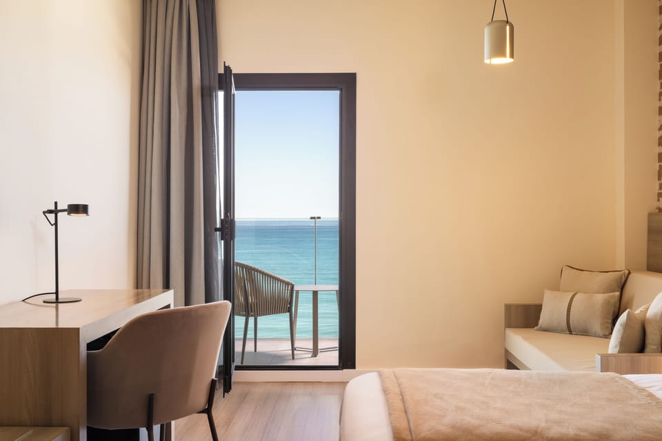 Twin Room, Balcony, Sea View | In-room safe, desk, blackout drapes, iron/ironing board