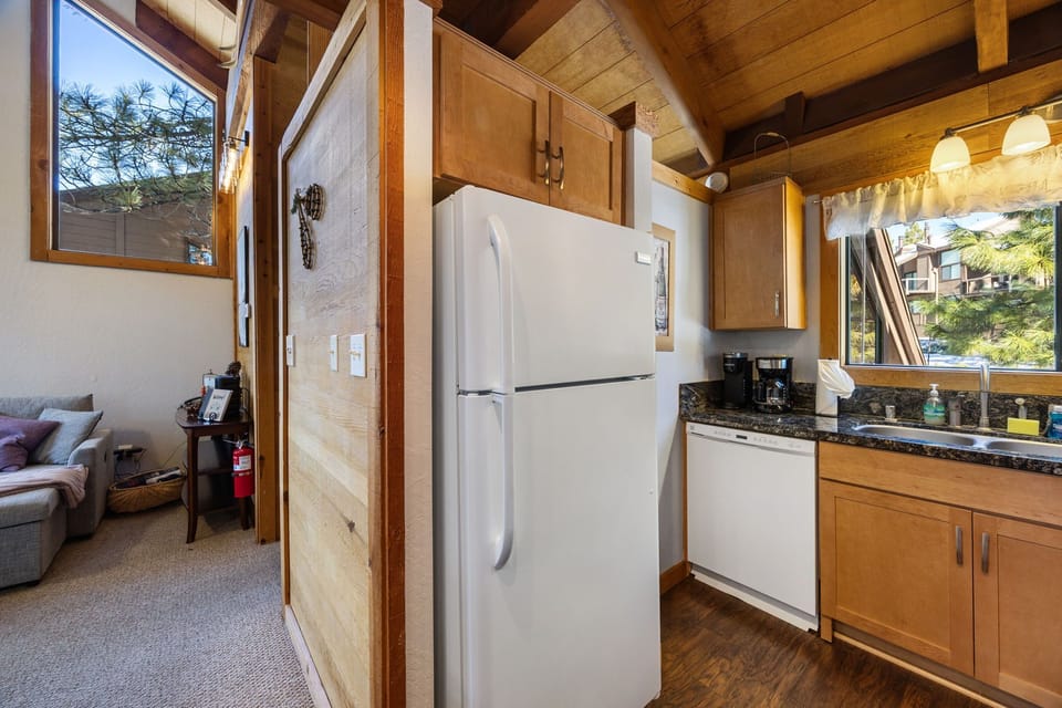 Alternate view of the kitchen with a Keurig and a drip coffee maker