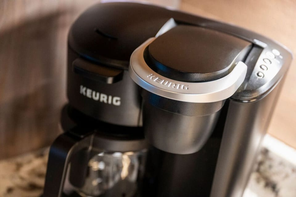 Wake up to the perfect cup of coffee at Wellevate Lodge with a Keurig coffee maker ready for your favorite brews. Enjoy a fresh start to your morning before stepping outside to take in the peaceful mountain views.