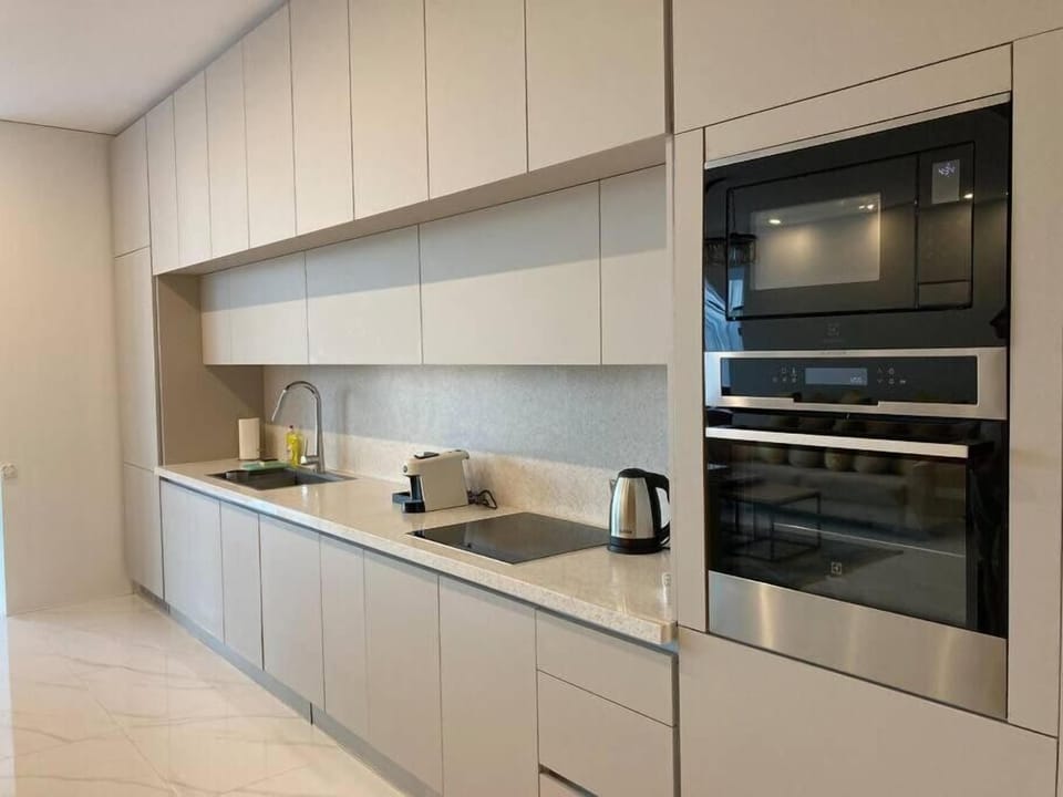 Family Apartment, River View | Private kitchen | Full-size fridge, microwave, oven, stovetop
