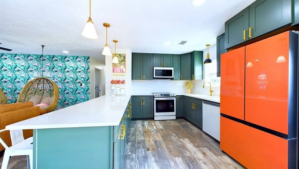 Cook with ease in this updated kitchen, fully equipped with pots, pans, glassware, utensils, sharp knives, a waffle maker, and toaster. Whether preparing a full meal or a quick snack, you'll have everything you need for hassle-free cooking.