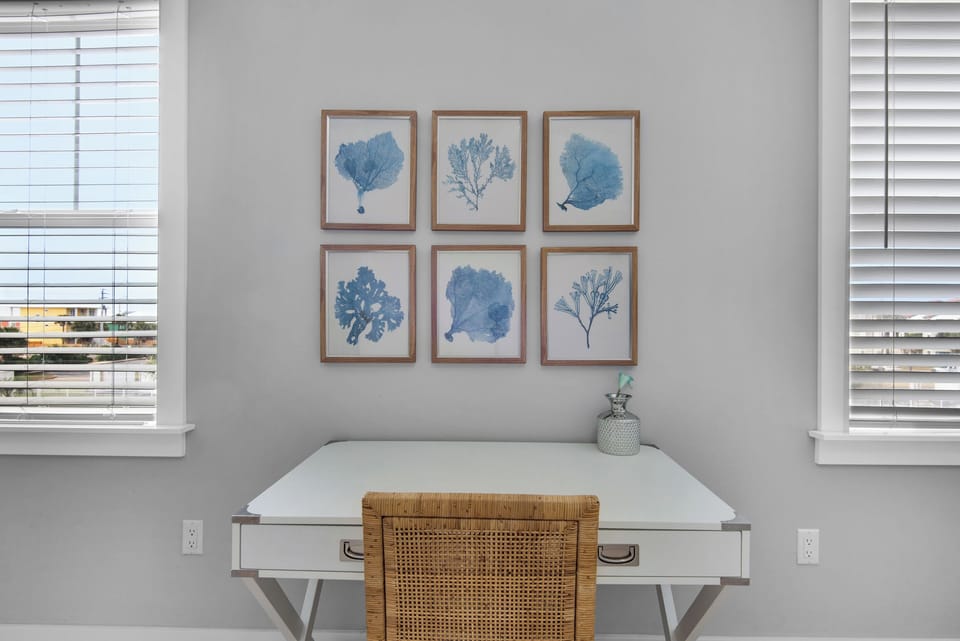 The master bedroom has a dedicated workspace