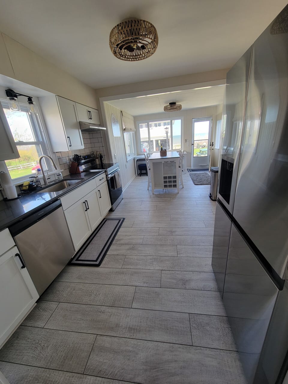 This Lake Erie view kitchen has new appliances and seating for 7.