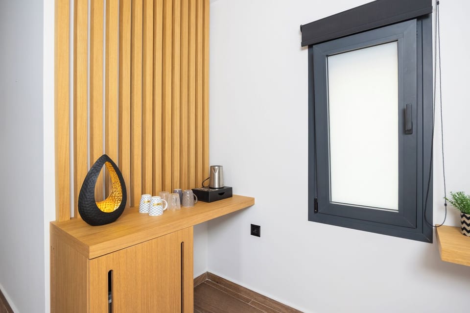 Deluxe Suite, Balcony, Partial Sea View | Minibar