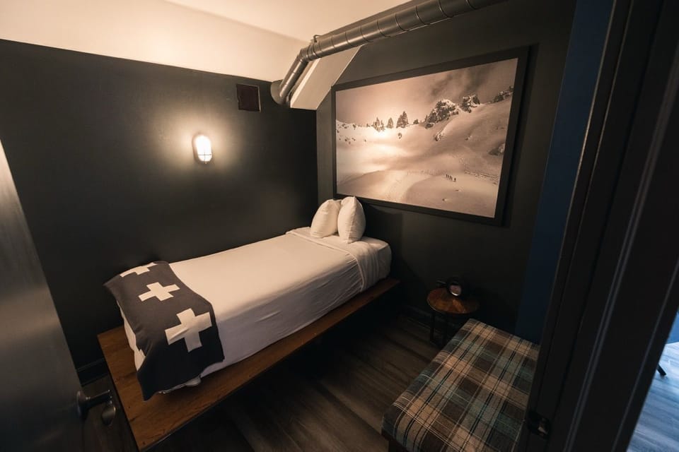 Sleek and modern Pod Room, offering a private and comfortable space for a restful night’s sleep.
