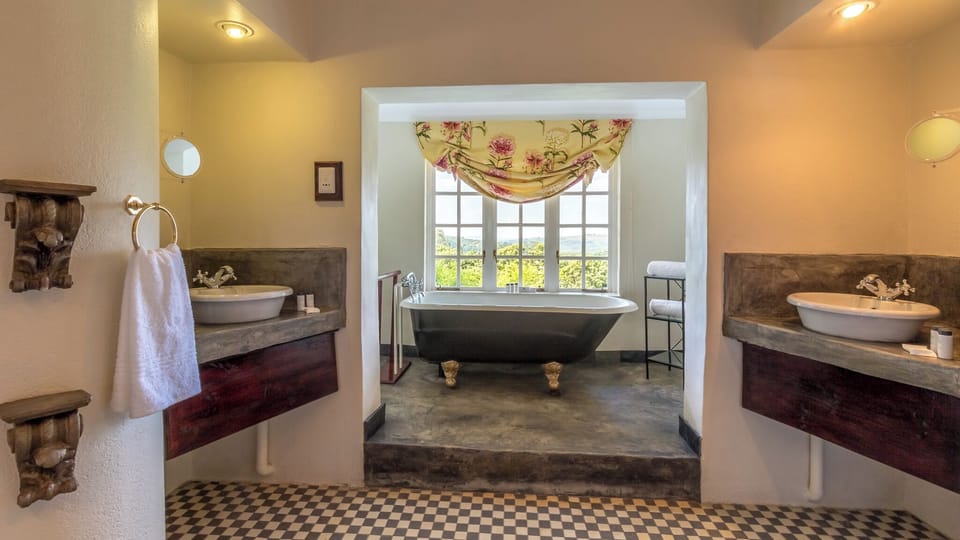 Luxury Double Room, 1 King Bed, Garden View | Bathroom | Separate tub and shower, deep soaking tub, hair dryer, bathrobes
