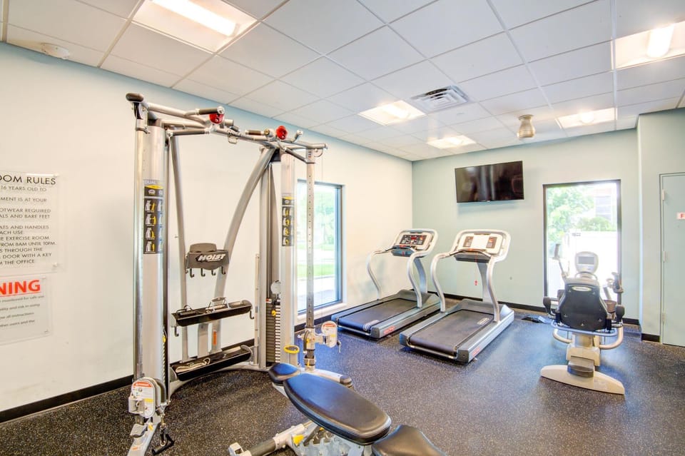 Bright, airy fitness room with modern workout equipment