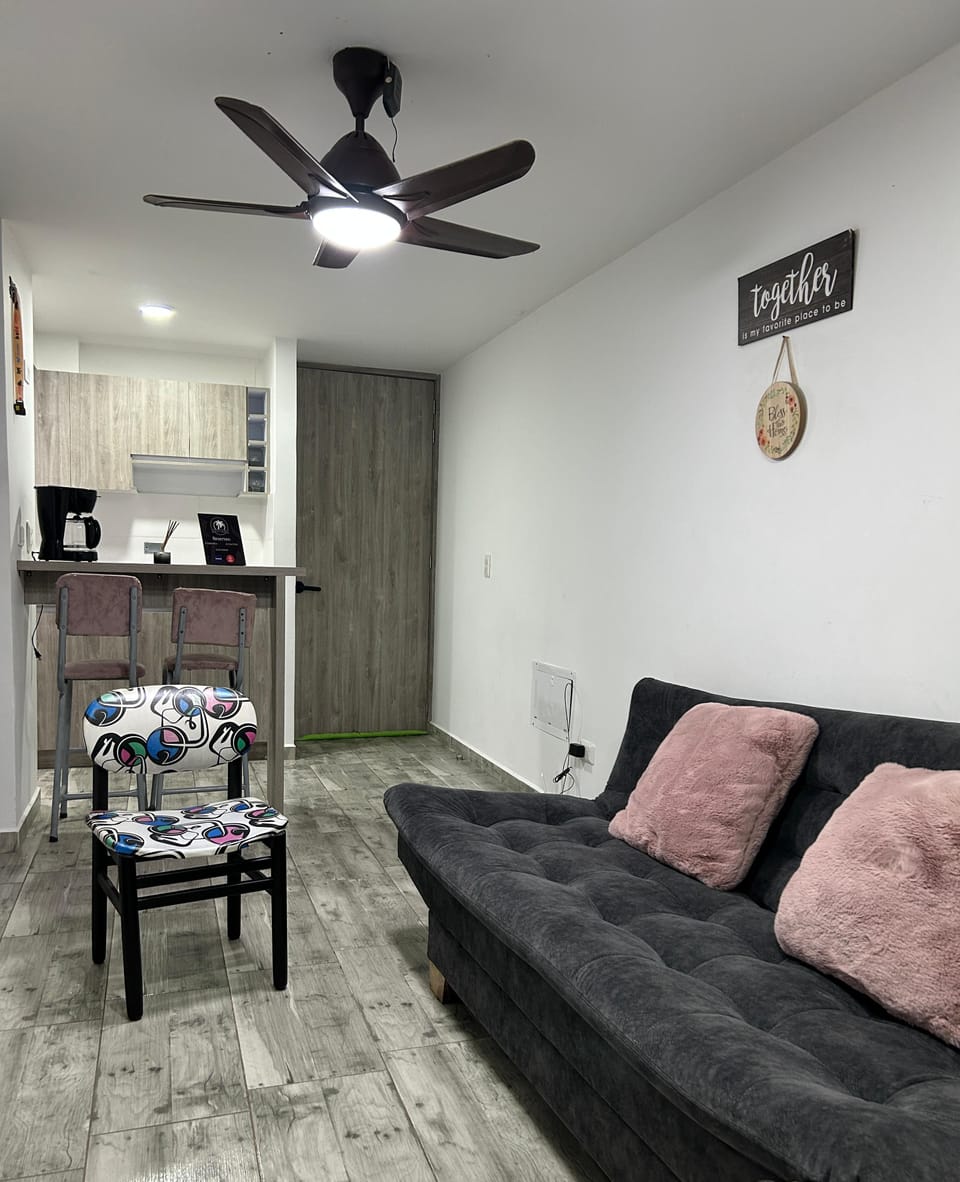Basic Apartment, Balcony | Living area | 40-inch flat-screen TV with digital channels, TV