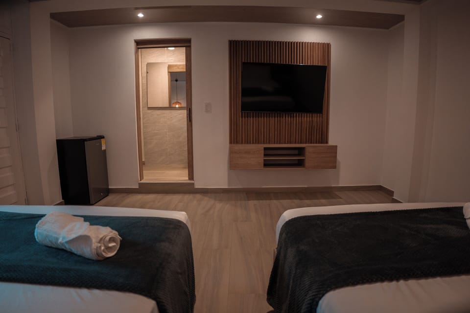 Superior Quadruple Room | In-room safe, blackout drapes, iron/ironing board (on request)