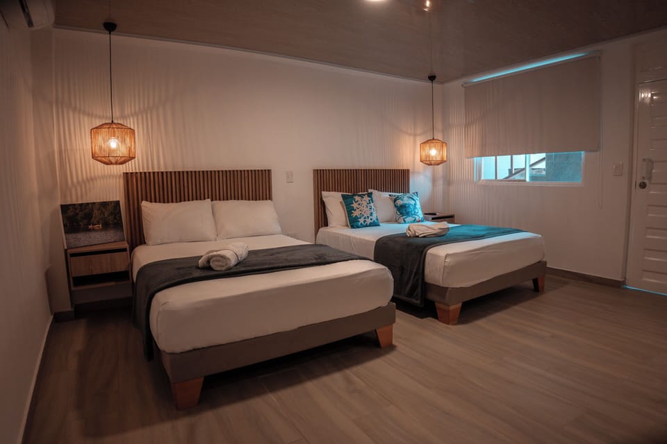 Superior Quadruple Room | In-room safe, blackout drapes, iron/ironing board (on request)
