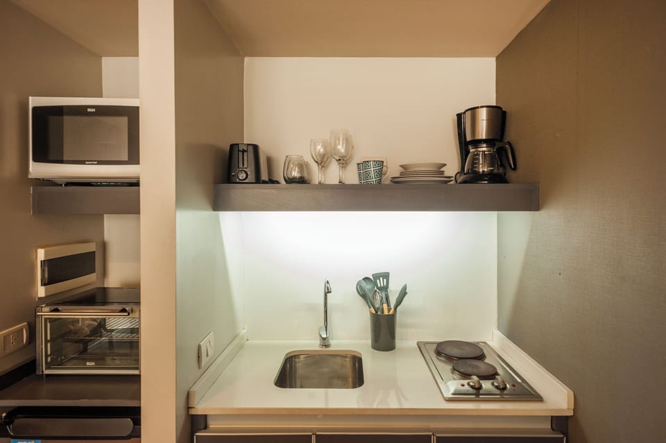 Basic Apartment, Balcony, City View | Private kitchen | Microwave, oven, stovetop, coffee/tea maker