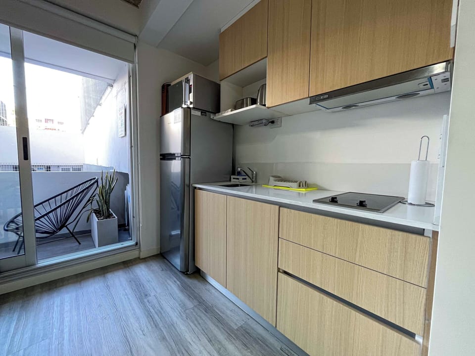 Classic Apartment, Multiple Beds, Balcony, City View | Private kitchenette | Microwave, stovetop, coffee/tea maker, electric kettle