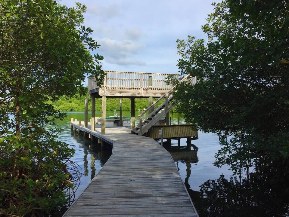 The boardwalk meets the water at our two story dock.