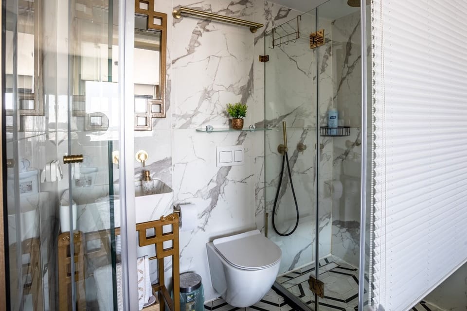 Panoramic Double Room, City View, Tower | Bathroom | Shower, hair dryer, shampoo, toilet paper