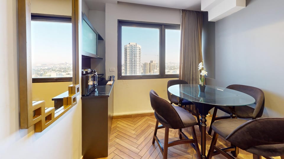 Deluxe Studio Suite, 1 King Bed with Sofa bed, City View, Tower | Free WiFi, bed sheets