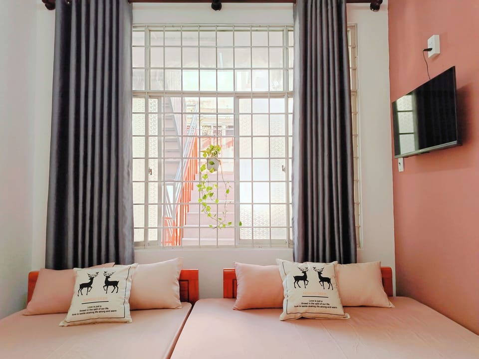 Comfort Quadruple Room | Premium bedding, desk, laptop workspace, free WiFi