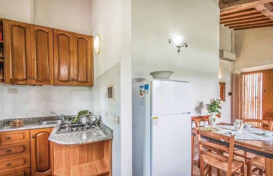 Flooring, Interior Design, Floor, Major Appliance, Kitchen Appliance, Room, Apartment, Kitchen, Ceiling, Wood Stain