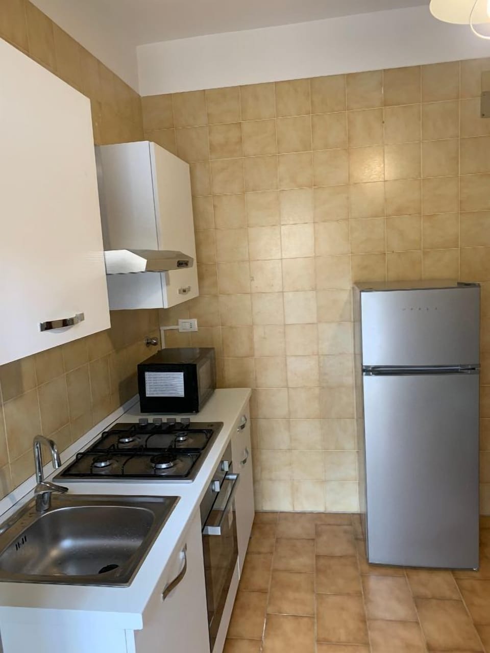 Deluxe Condo, City View | Private kitchen | Microwave, oven, stovetop, espresso maker