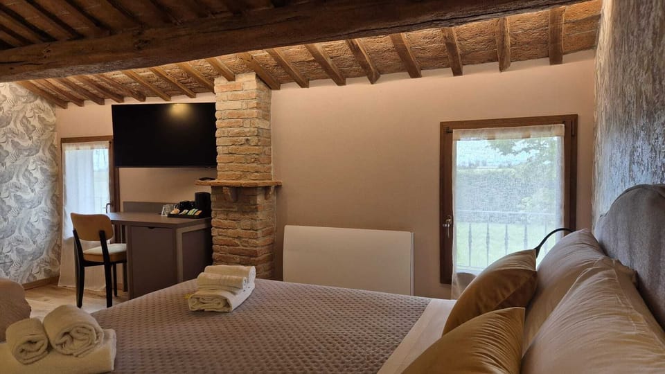 Family Room | Free minibar, in-room safe, desk, laptop workspace