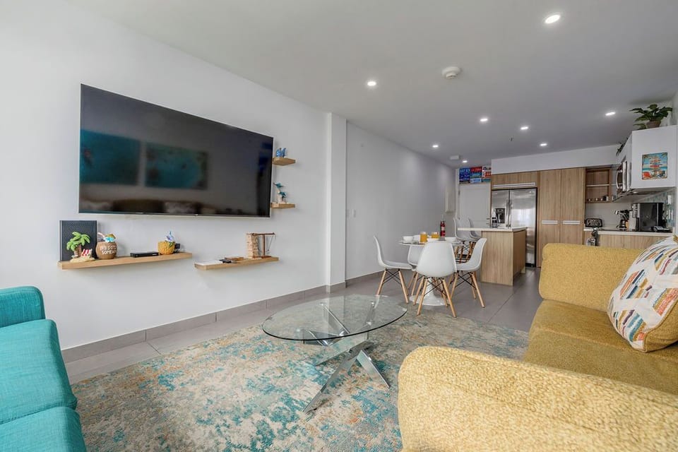 Stay energized with a fully equipped workout space featuring free weights, cardio equipment, and an inspiring ocean view to motivate your fitness routine.
